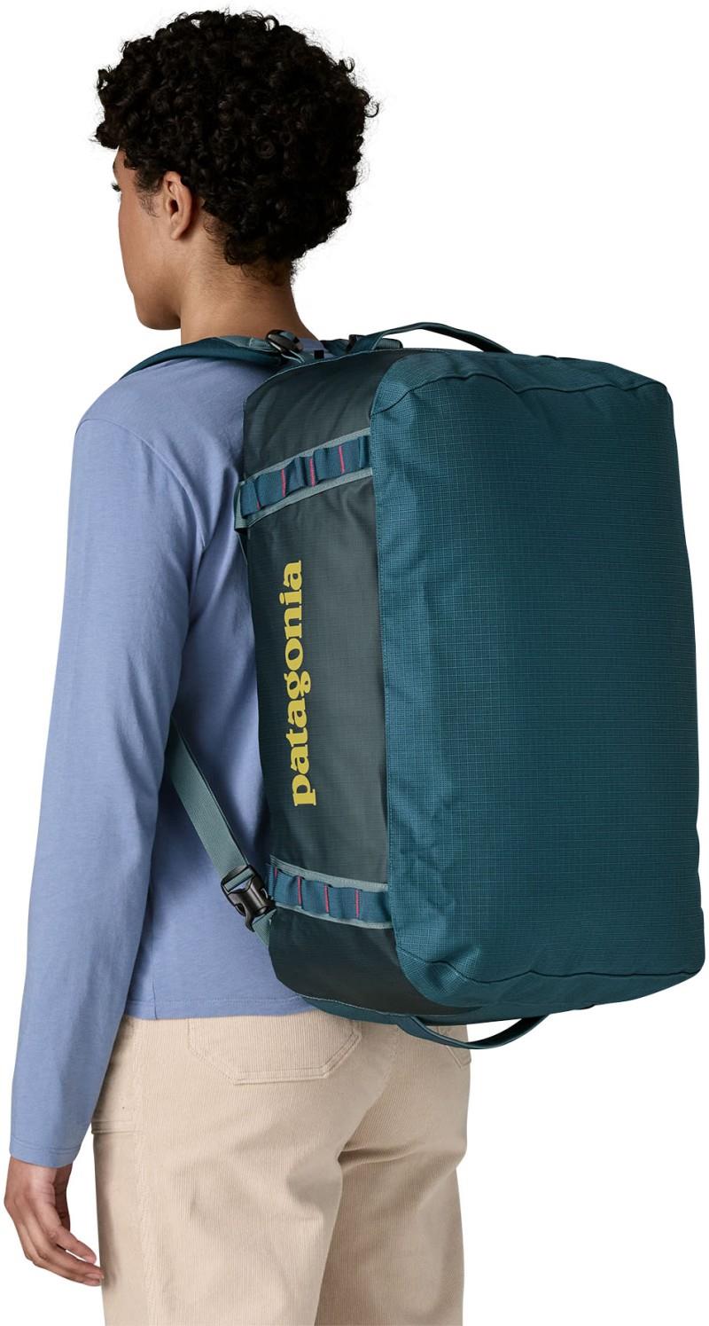 Black Hole Duffel 40L - tidal teal w/luminous pink 1