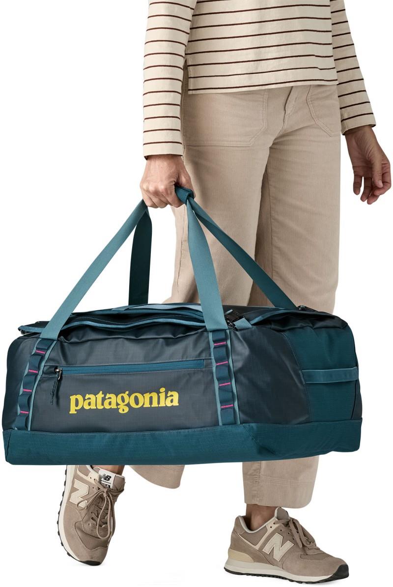 Black Hole Duffel 55L - tidal teal w/luminous pink 1