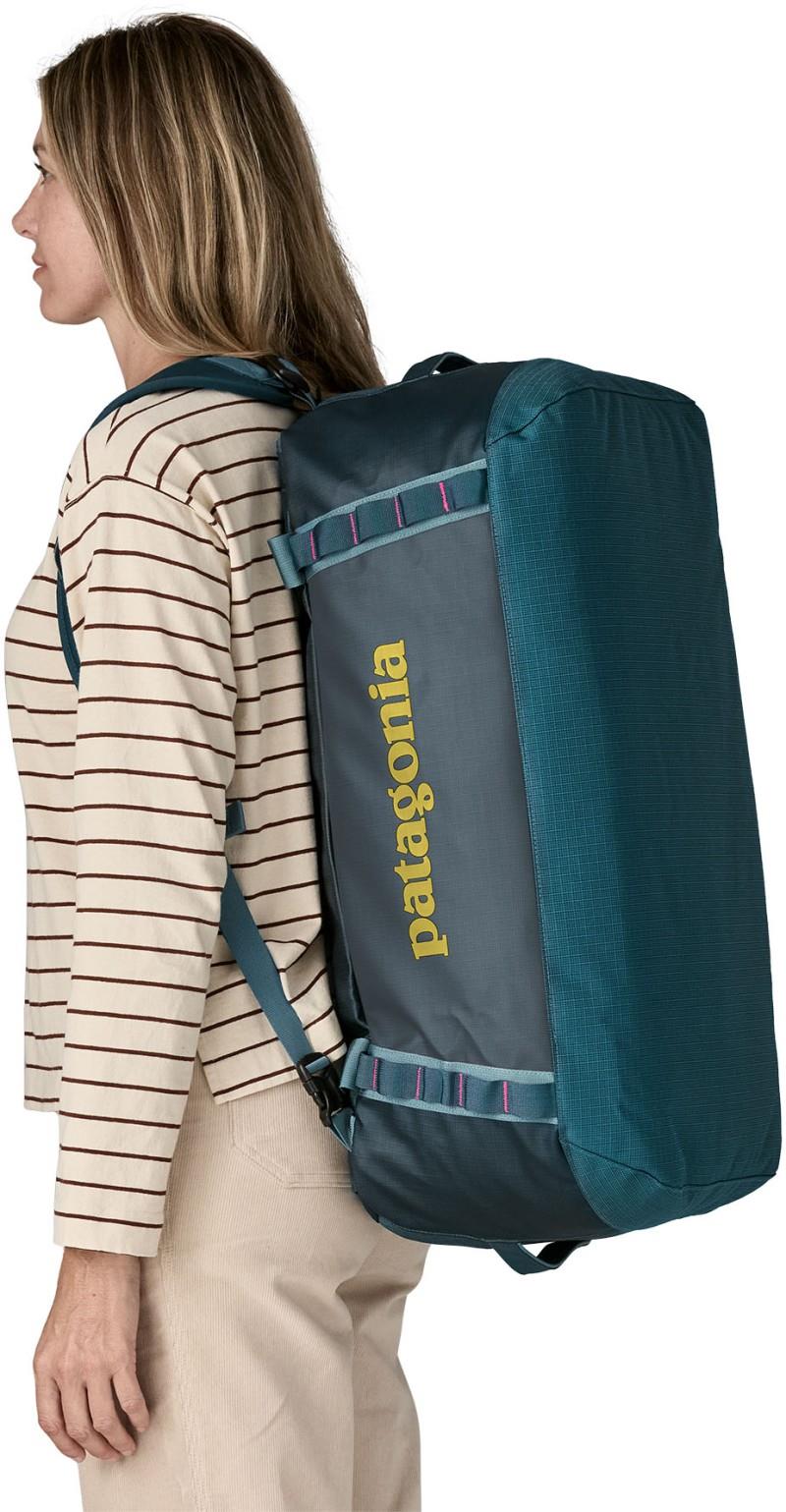 Black Hole Duffel 55L - tidal teal w/luminous pink 1