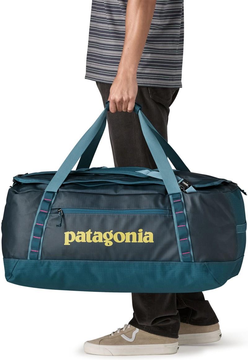 Black Hole Duffel 70L - tidal teal w/luminous pink 1