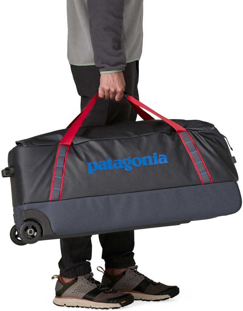 Black Hole Wheeled Duffel 100L - smolder blue w/amanita red 1