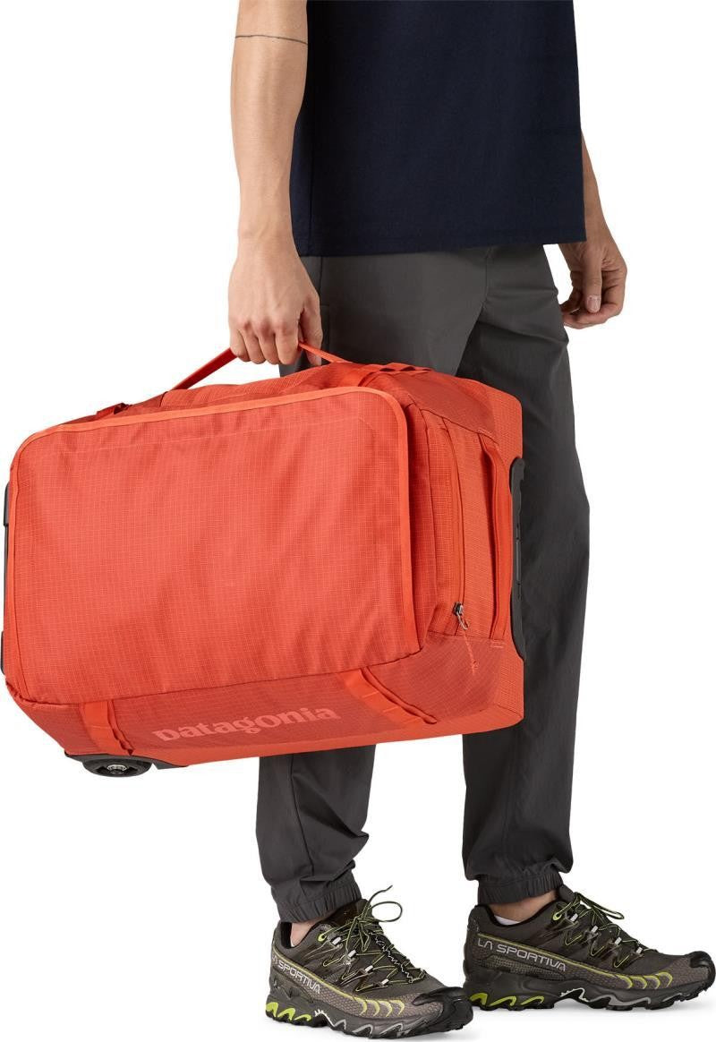 Black Hole Wheeled Duffel 40L - pollinator orange 1